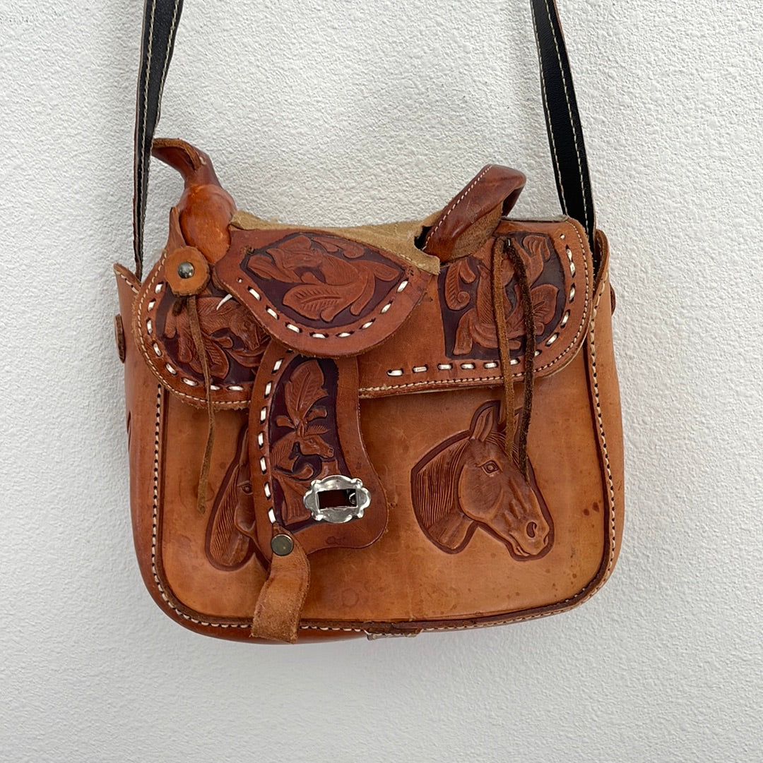 Vintage tooled saddle bag leather