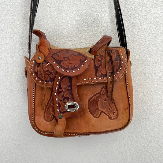 Vintage tooled saddle bag leather