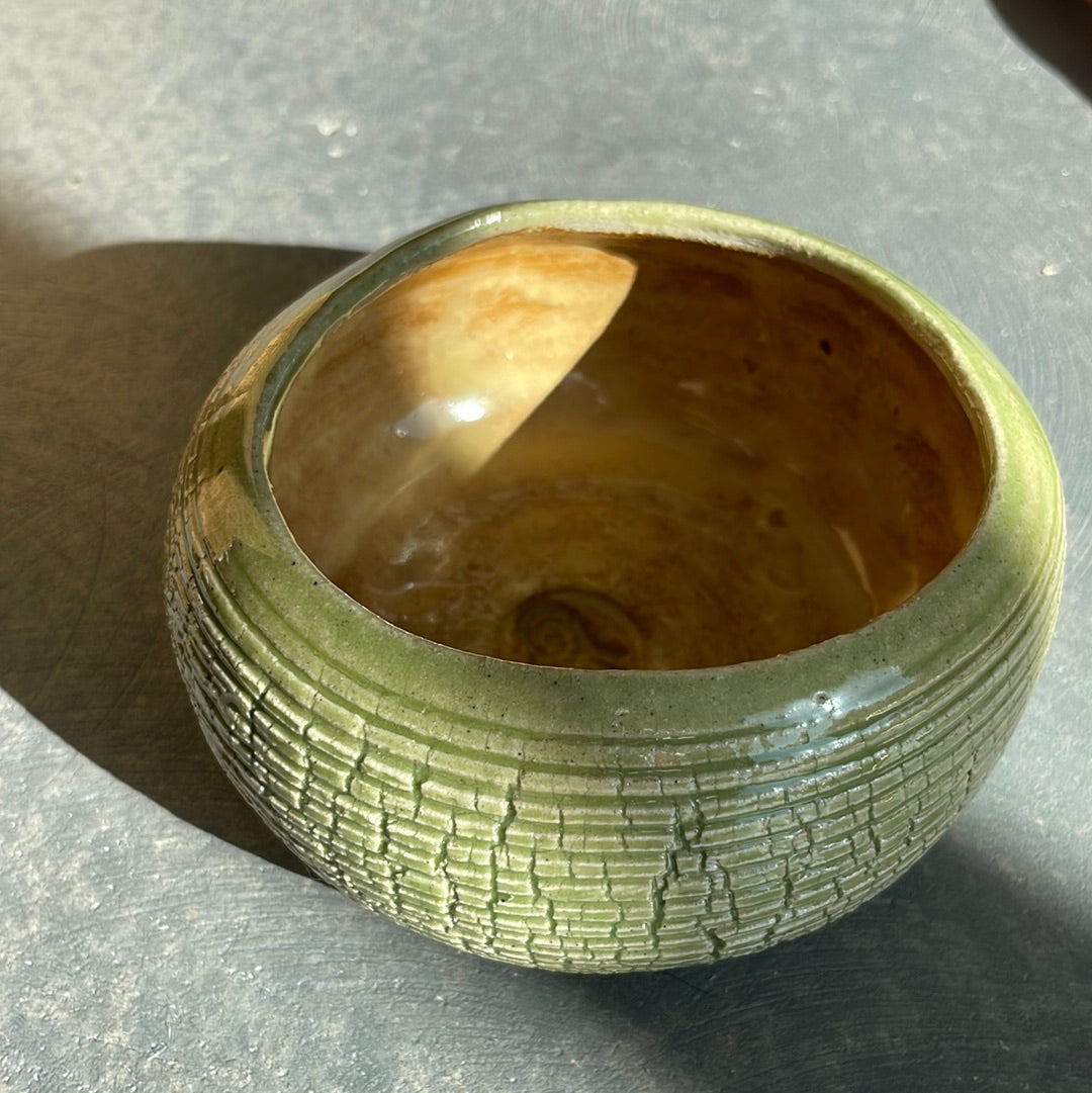 Green clay vase